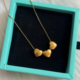 Triple hearts necklace