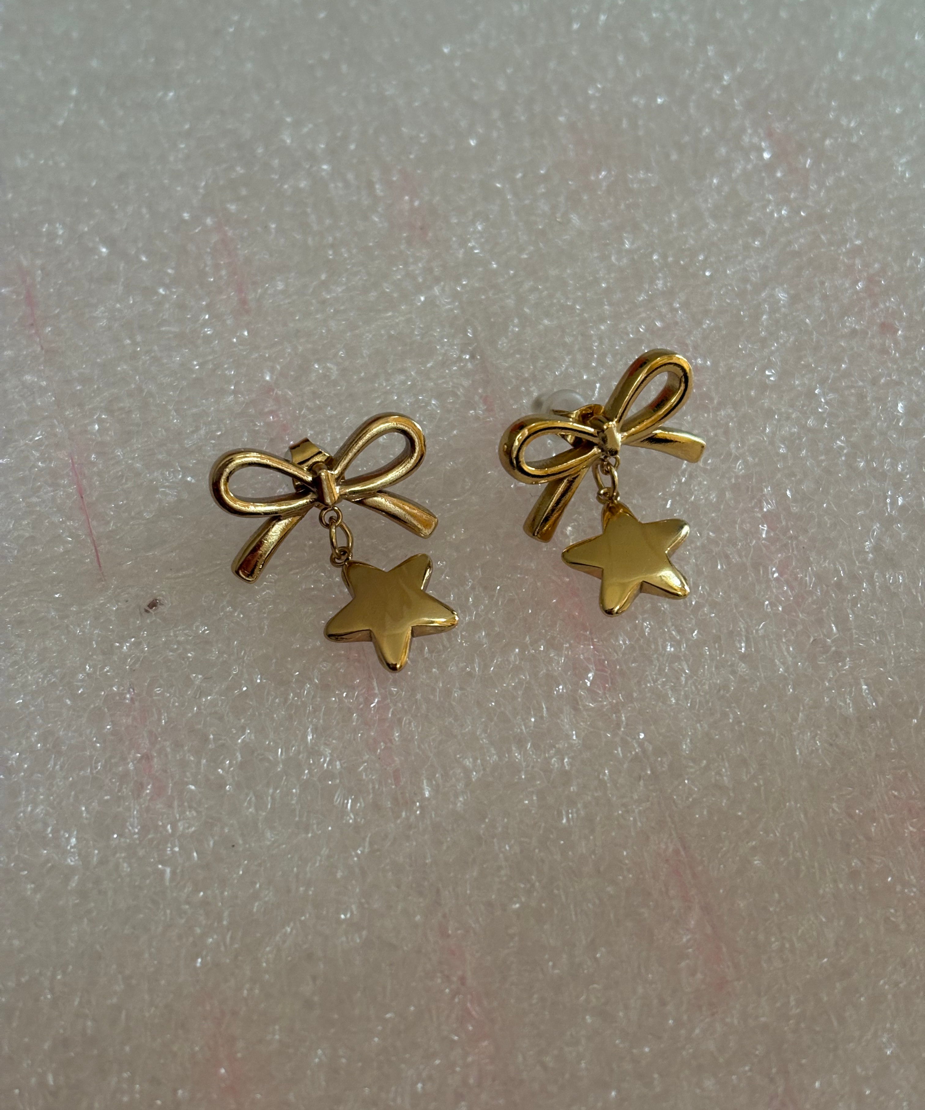 Star bow earring