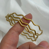 Wavy bangles