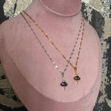 Doll necklace