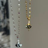 Doll necklace