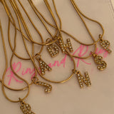 Initial studded necklace